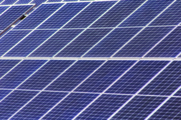 Endless cells of solar panels farm generating renewable electricity from sun energy in Australia, NSW.